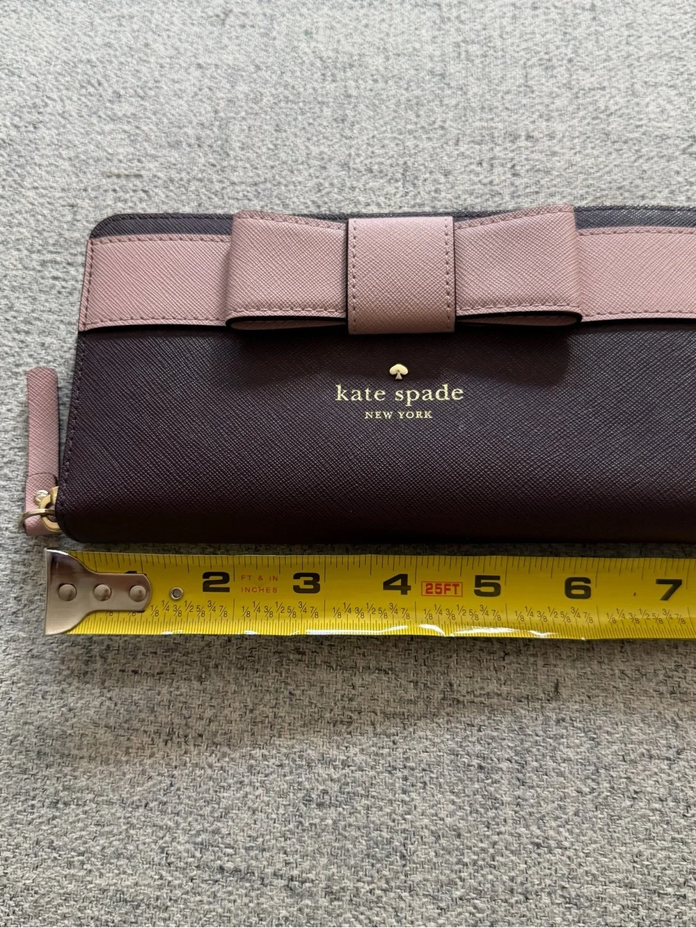 kate spade two-tone bow continental wallet in burgundy and blush
